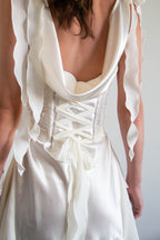 Close up back image of pearl white two-piece corset dress. Australian-made with worldwide delivery available.