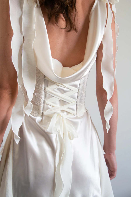 Close up back image of pearl white two-piece corset dress. Australian-made with worldwide delivery available.