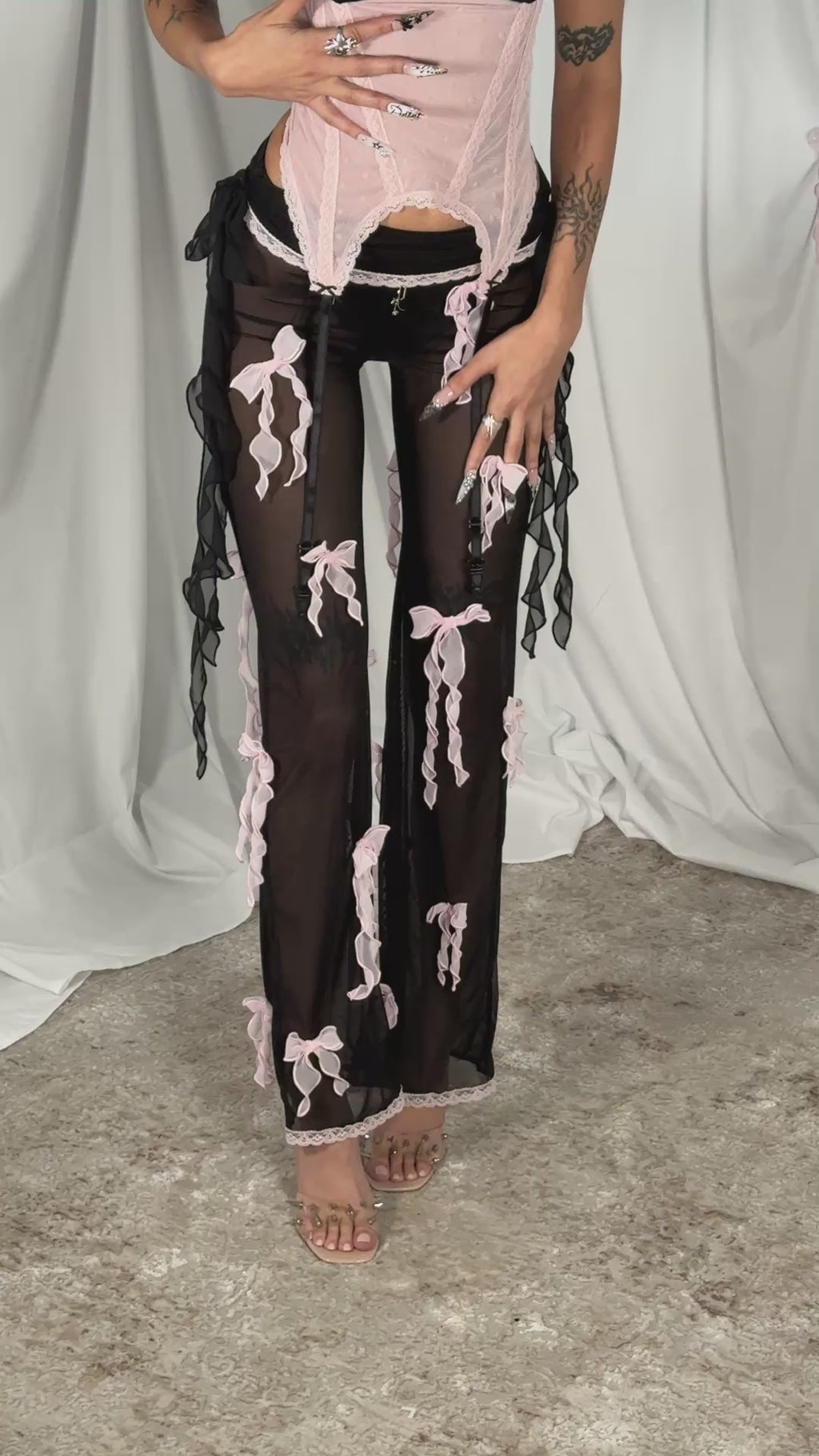 black festival rave pants see through with pink bows